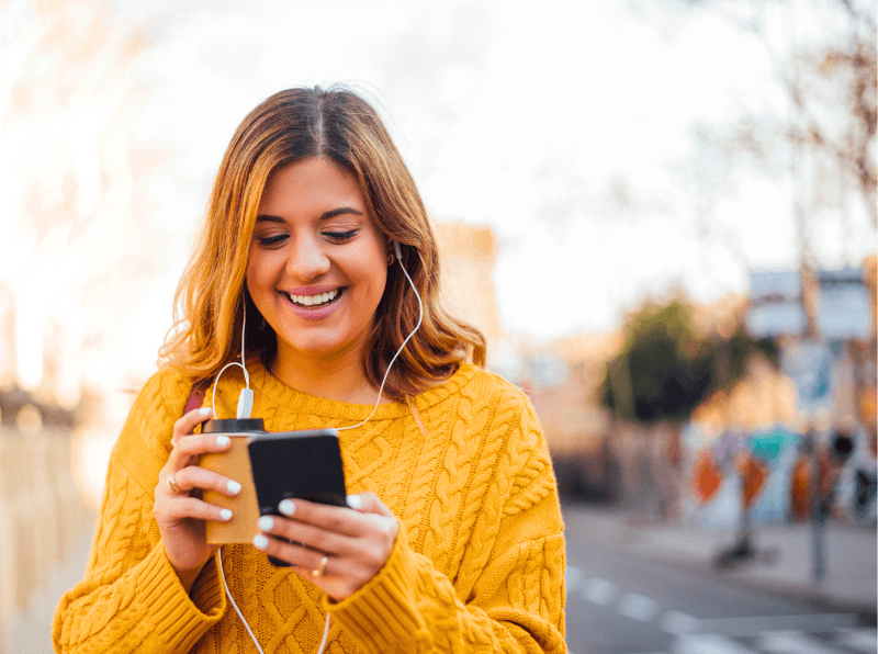 Canva - person looking at their phone (1)