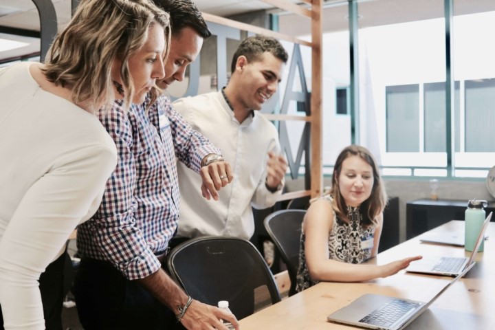 People meeting informally around a table