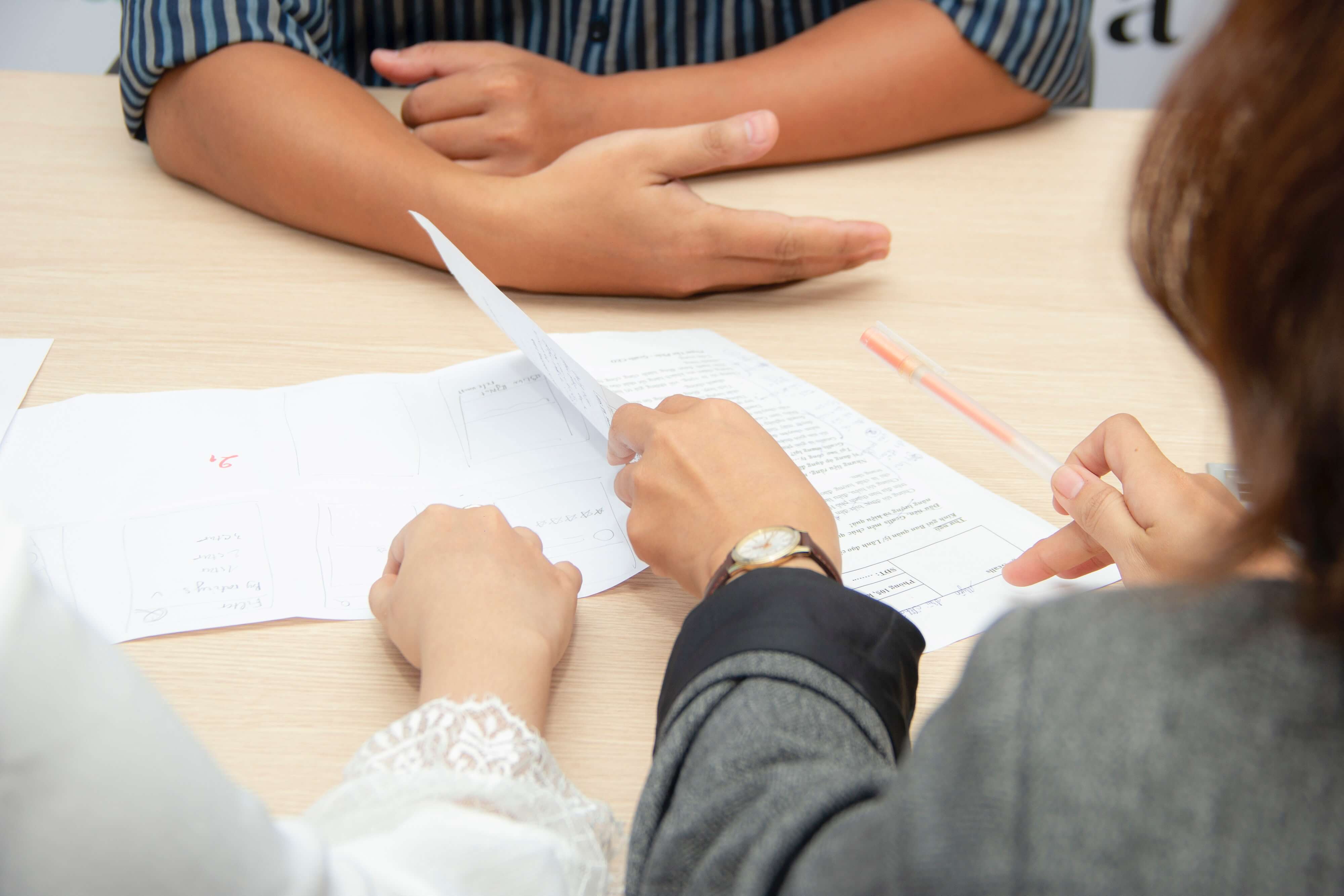 People meeting at a desk